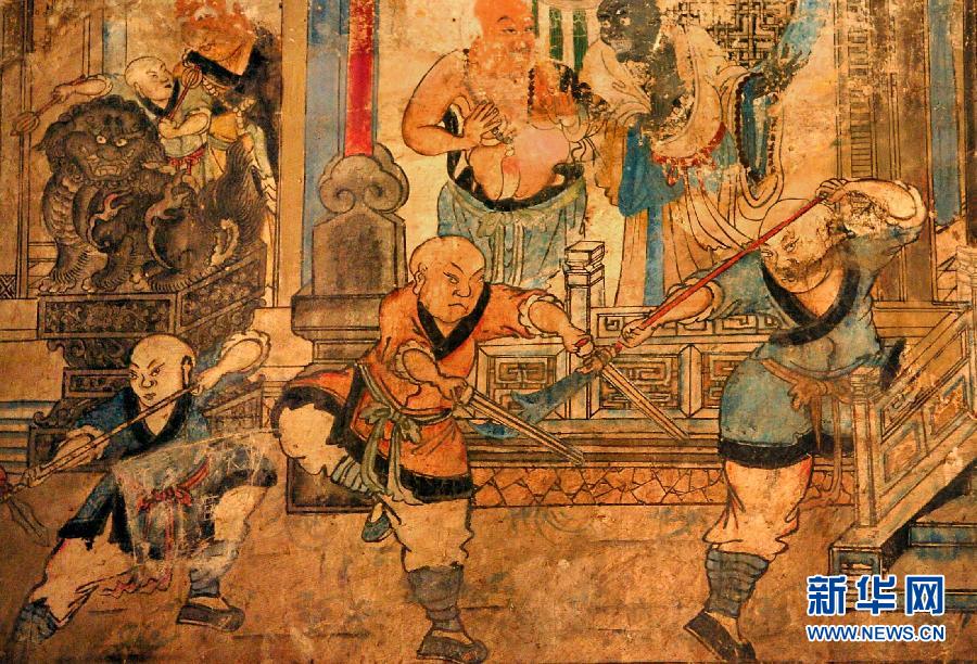 少林寺白衣殿內(nèi)的墻上表現(xiàn)少林武僧習(xí)武練拳的壁畫(huà)(局部,2005年9月15日攝)。