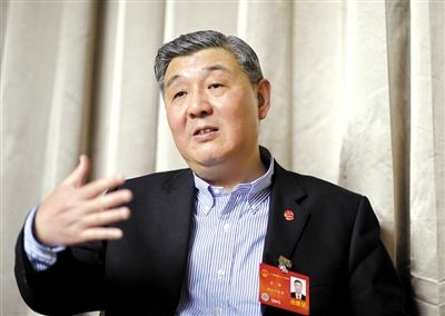 今年全國兩會期間，全國人大代表、浙江高院院長齊奇接受記者采訪。新京報記者 陳杰 攝