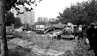 對公園選址的5.5萬多平方米的違章建筑進行拆除。