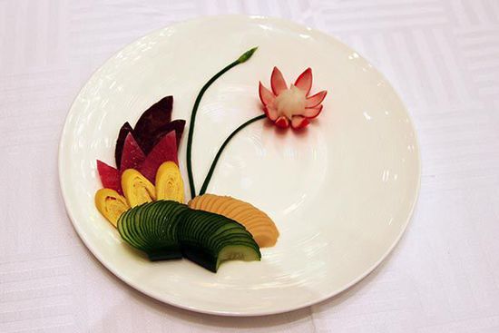 迎賓冷盤(pán)“洋花蘿卜”。 花惠生 供圖